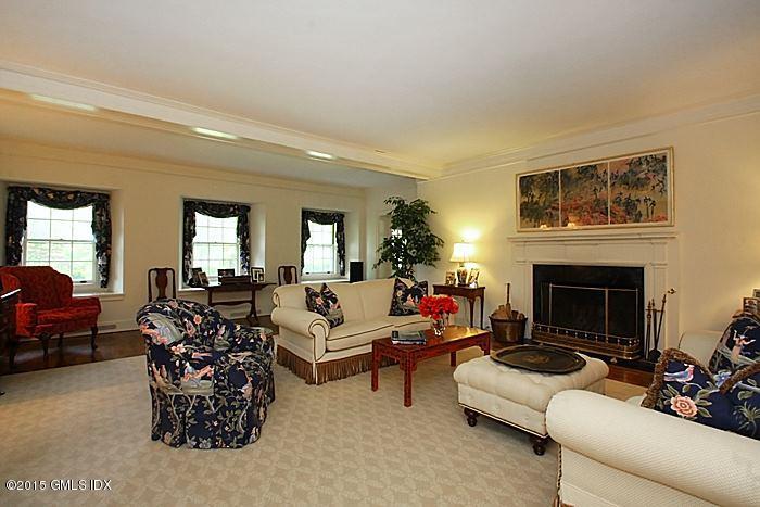 25 Ridgeway Greenwich, CT 06831 - Photo 7 of 25 a living room with furniture and a fireplace