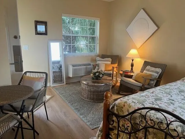 a living room with furniture and a window