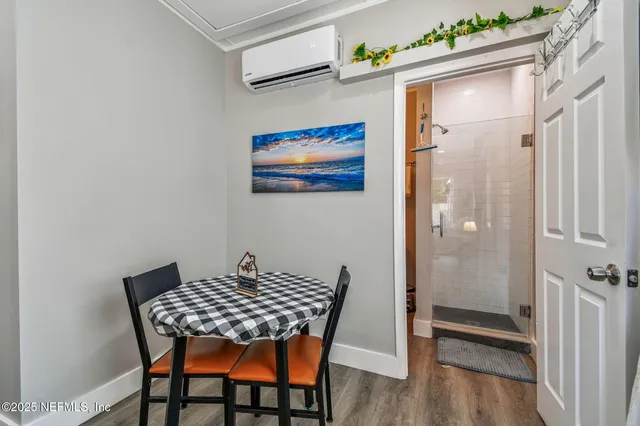 a bathroom with a toilet sink and shower
