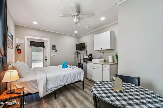 a view of livingroom with furniture and floor to ceiling window