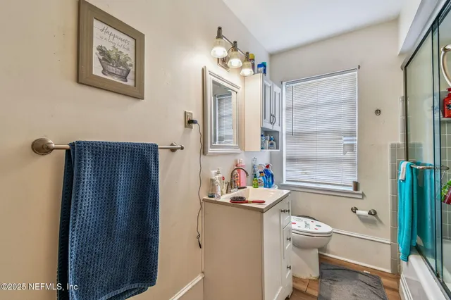 a kitchen with stainless steel appliances a stove a sink and a refrigerator