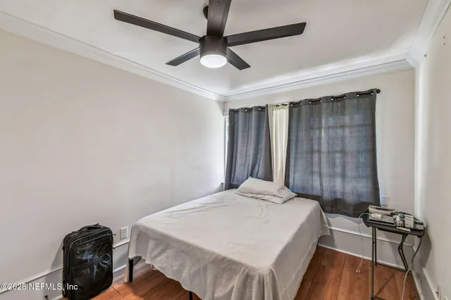 a view of balcony with wooden floor and outdoor seating