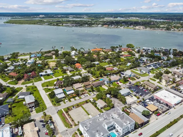an aerial view of a house with a garden