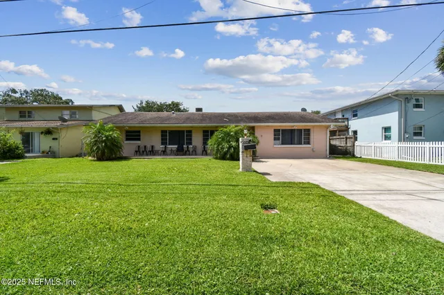 a front view of house with yard
