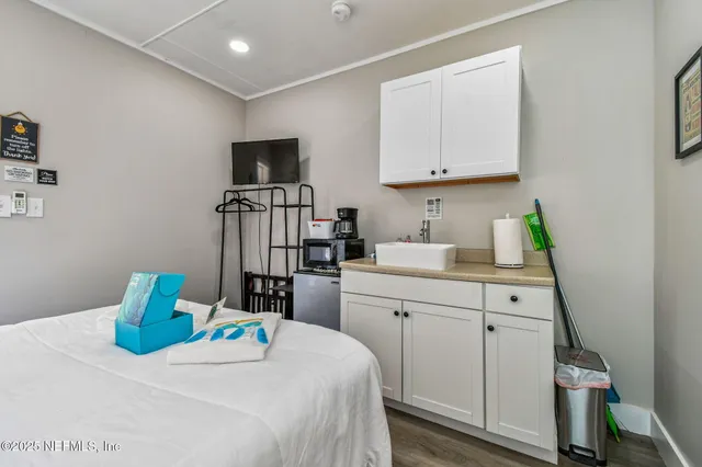 a bathroom with a toilet and a sink