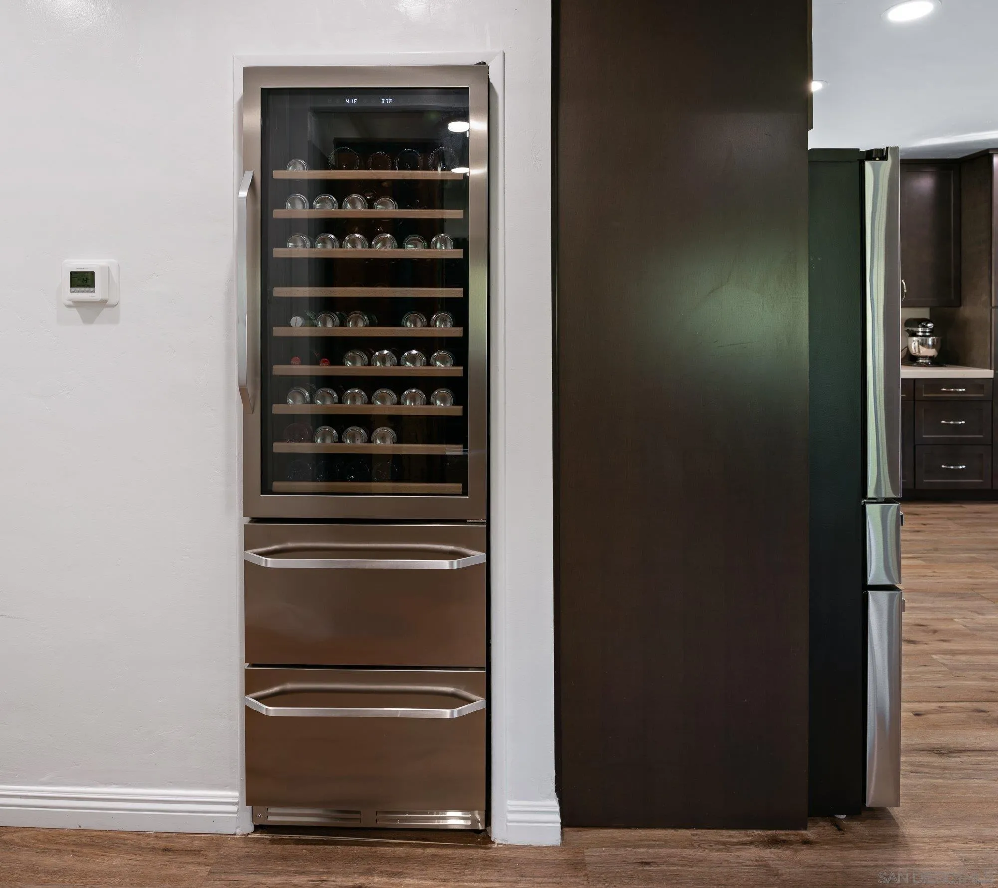 1780 Grove Road El Cajon, CA 92020 - Photo 16 of 59 a view of walk in closet with racks on the wall