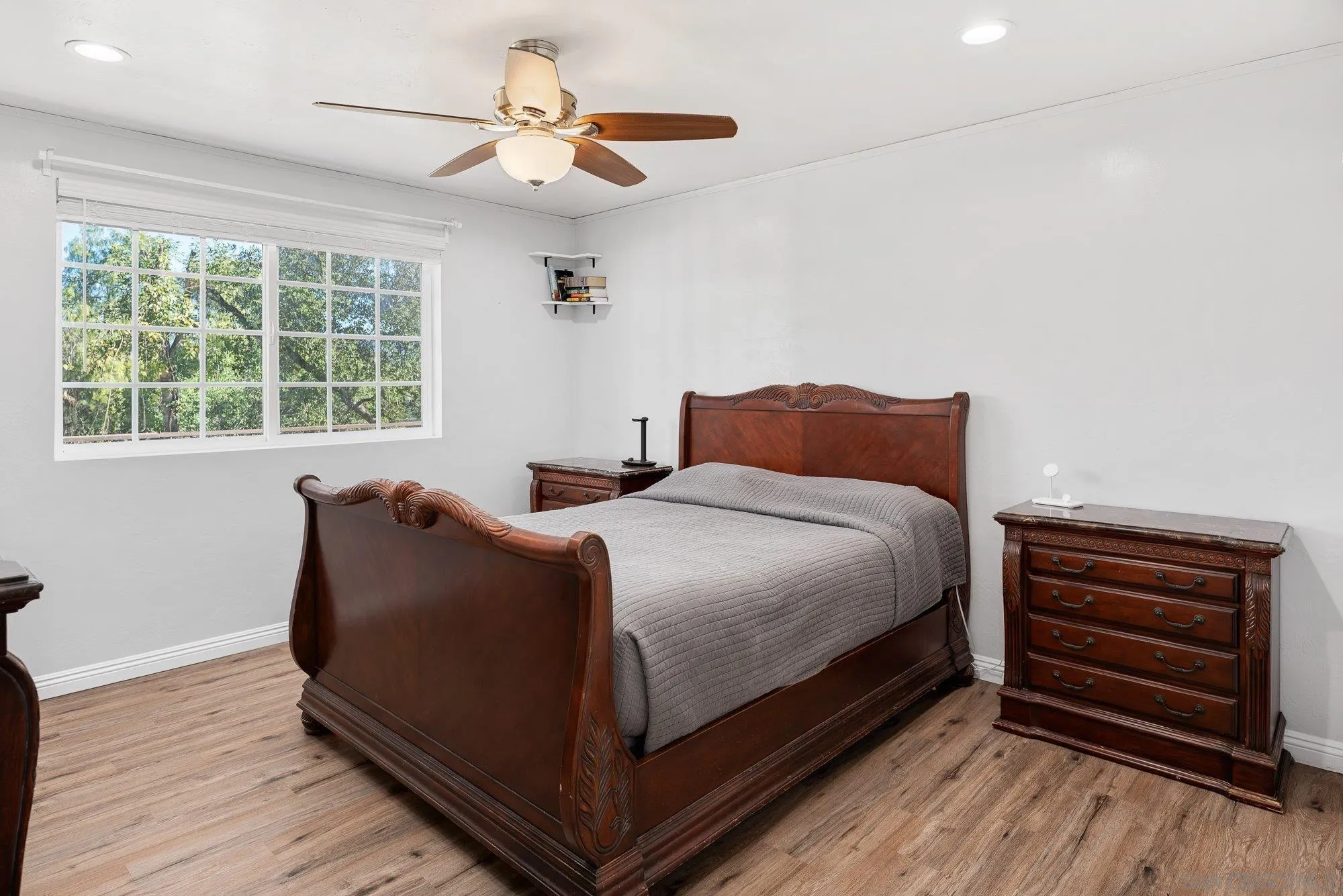 1780 Grove Road El Cajon, CA 92020 - Photo 23 of 59 a bedroom with a bed and a window