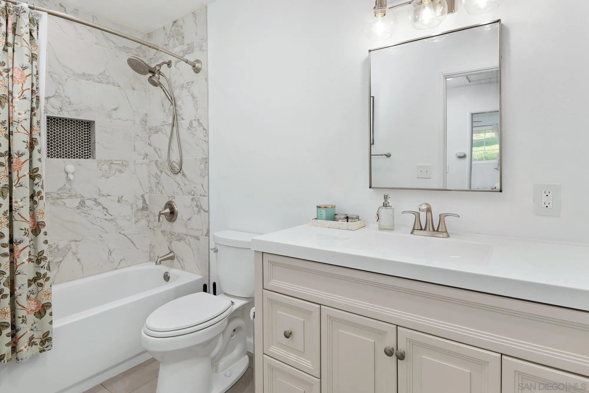 1780 Grove Road El Cajon, CA 92020 - Photo 27 of 59 a bathroom with a sink a toilet and a bathtub
