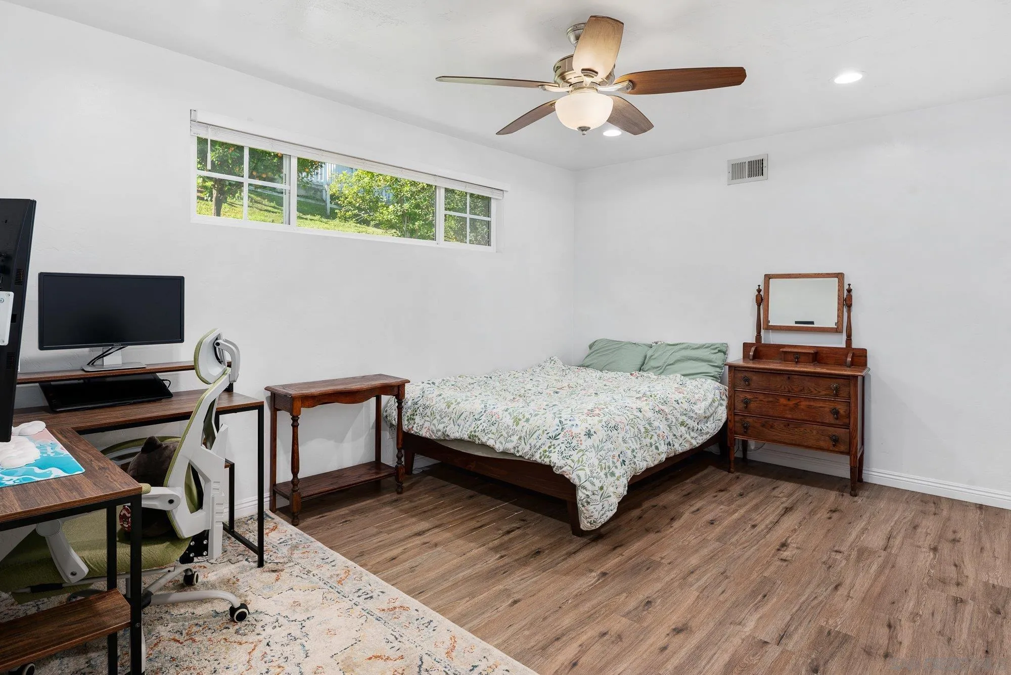 1780 Grove Road El Cajon, CA 92020 - Photo 29 of 59 a bedroom with a bed and a desk