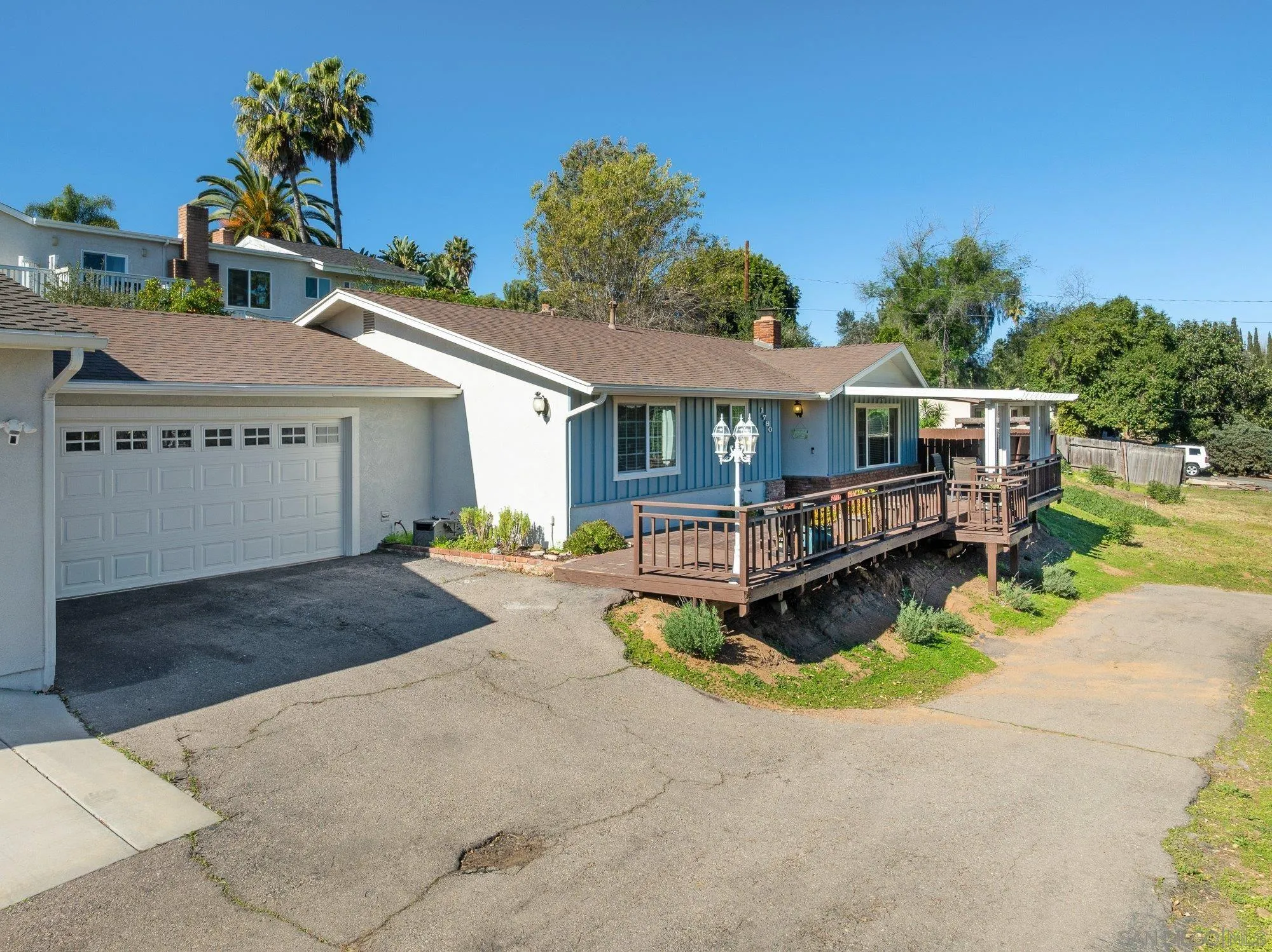 1780 Grove Road El Cajon, CA 92020 - Photo 41 of 59 front view of a house with a small yard