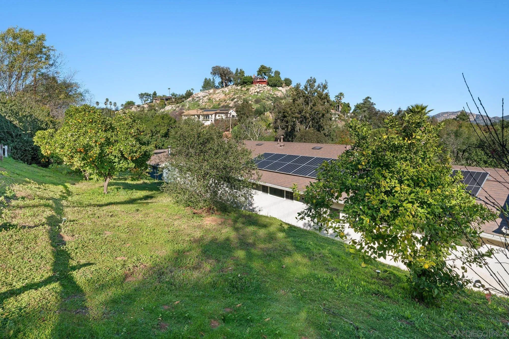 1780 Grove Road El Cajon, CA 92020 - Photo 48 of 59 a backyard of a house with lots of green space