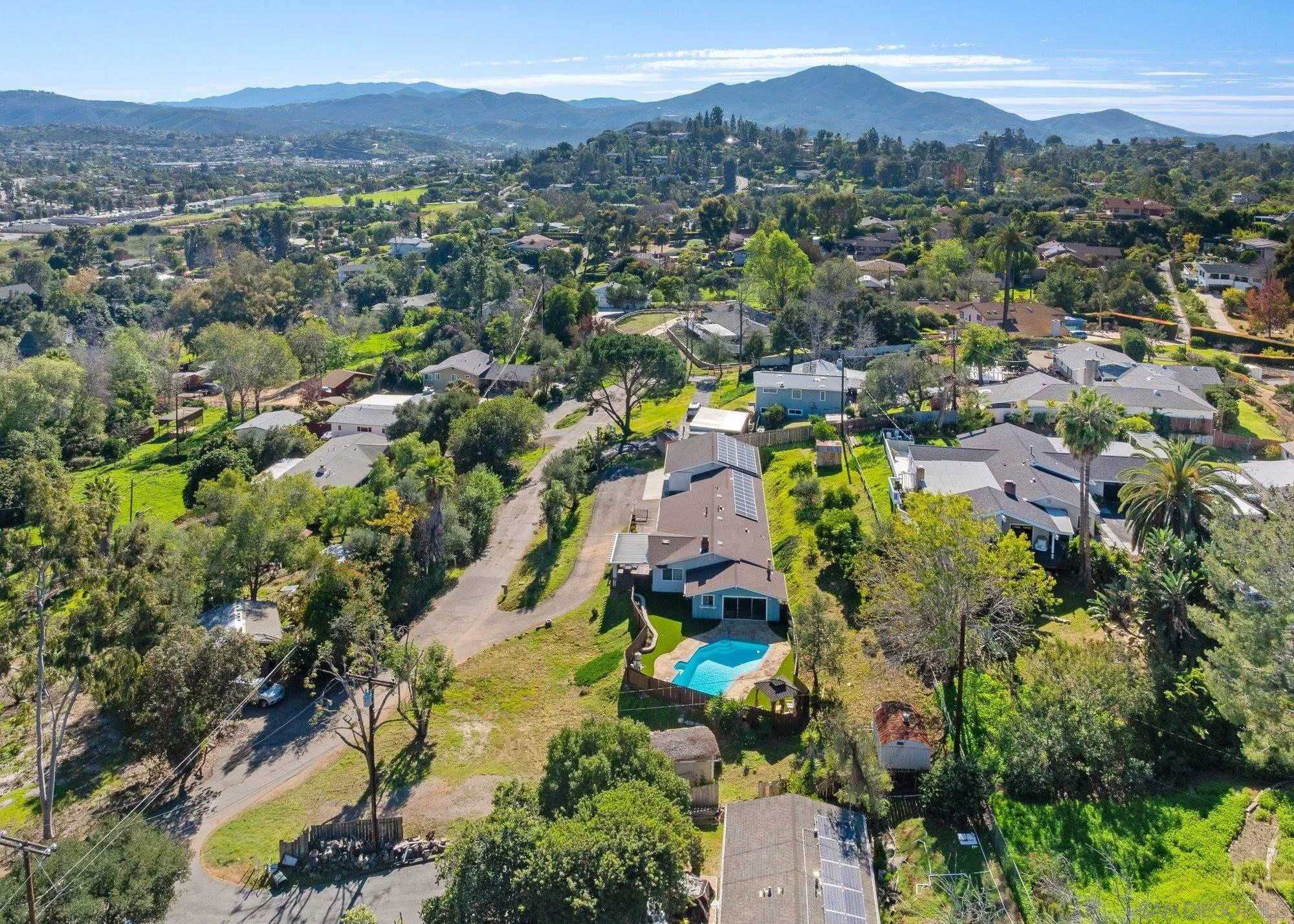 1780 Grove Road El Cajon, CA 92020 - Photo 50 of 59 an aerial view of a houses with a street and trees