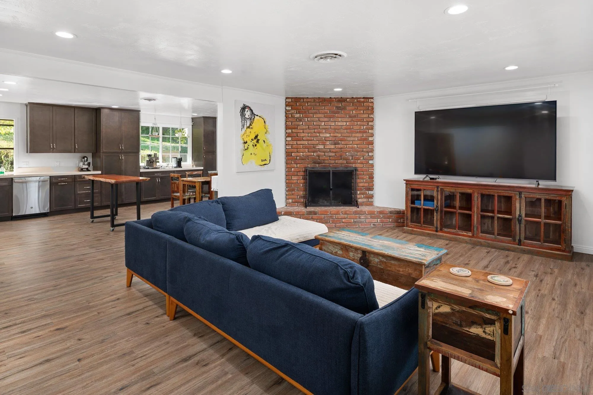 1780 Grove Road El Cajon, CA 92020 - Photo 9 of 59 a living room with fireplace furniture and a flat screen tv