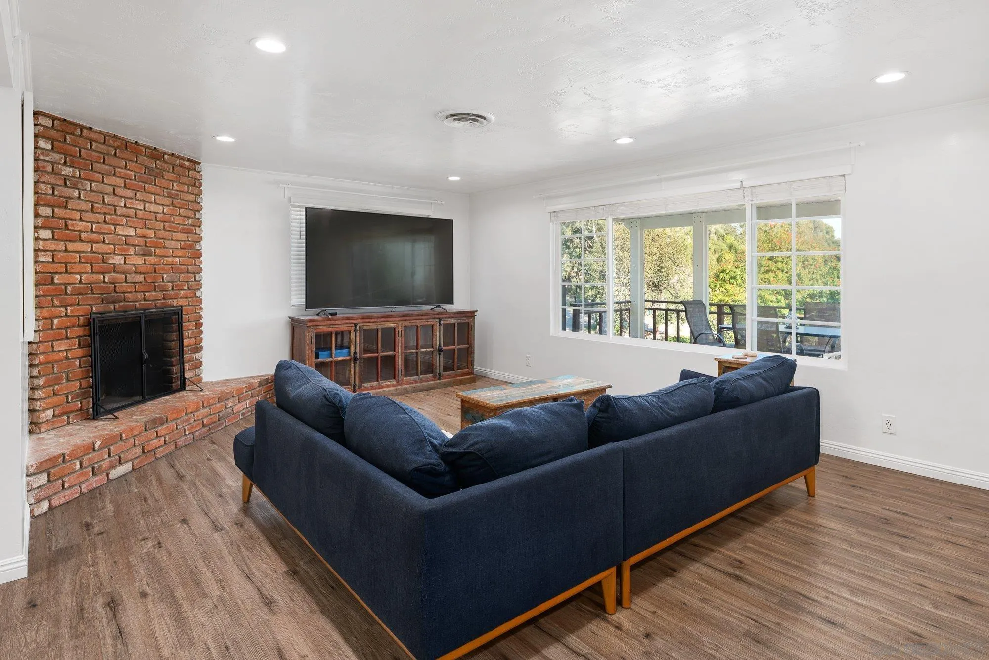 1780 Grove Road El Cajon, CA 92020 - Photo 10 of 59 a living room with furniture and a flat screen tv