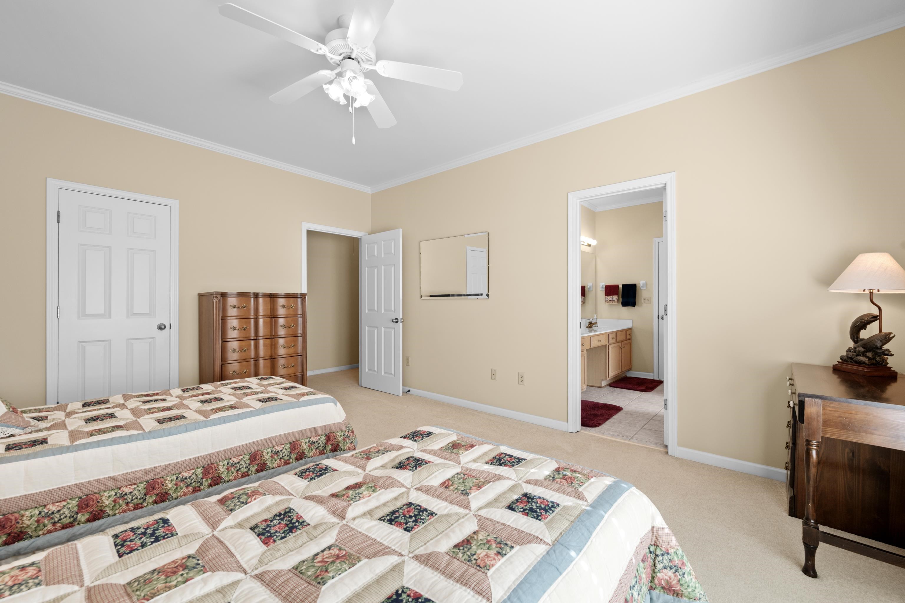 192 North White Station Road Memphis, TN 38117 - Photo 28 of 40 a bedroom with a bed and a television