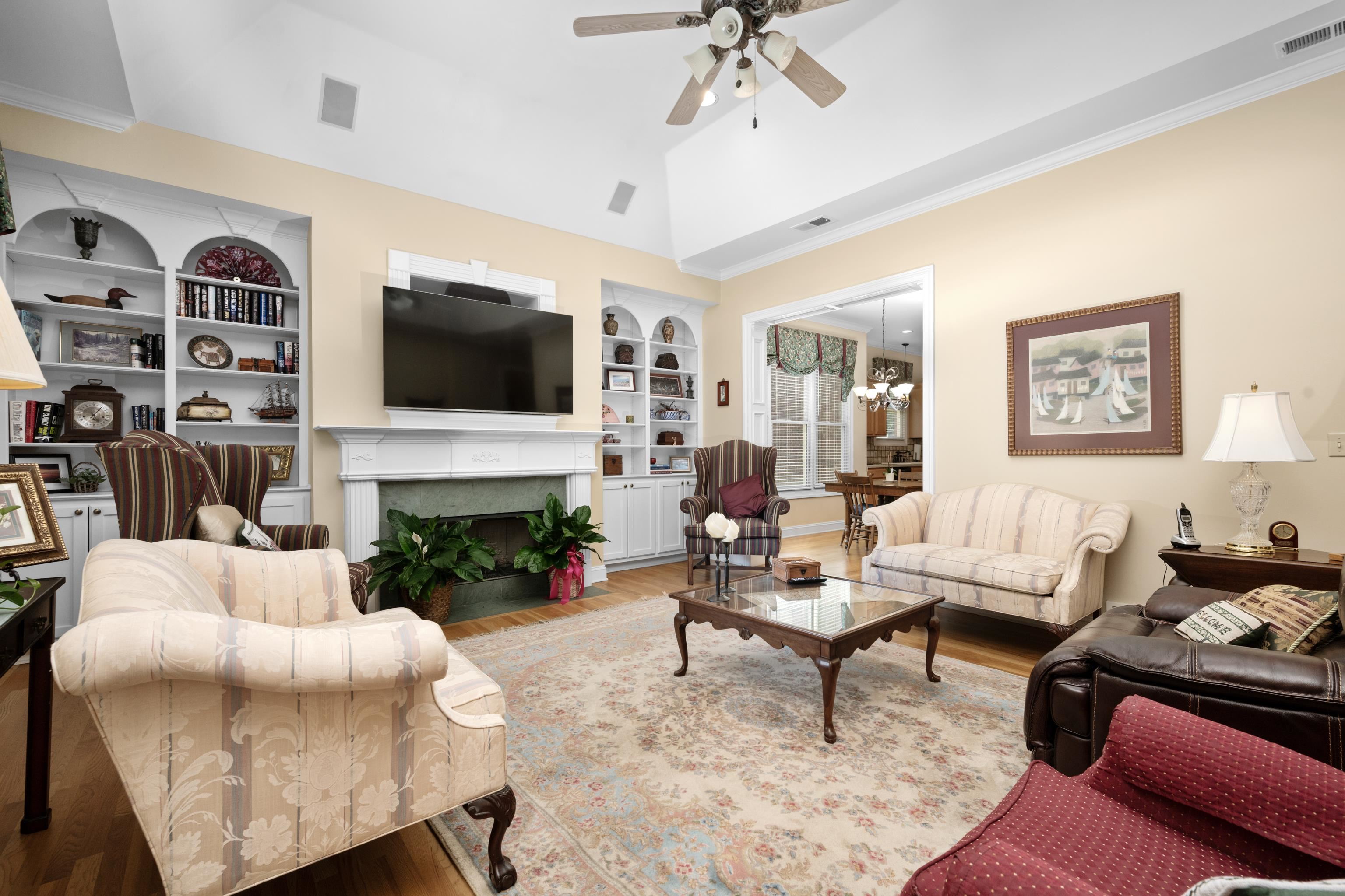 192 North White Station Road Memphis, TN 38117 - Photo 32 of 40 a living room with furniture a fireplace and a flat screen tv