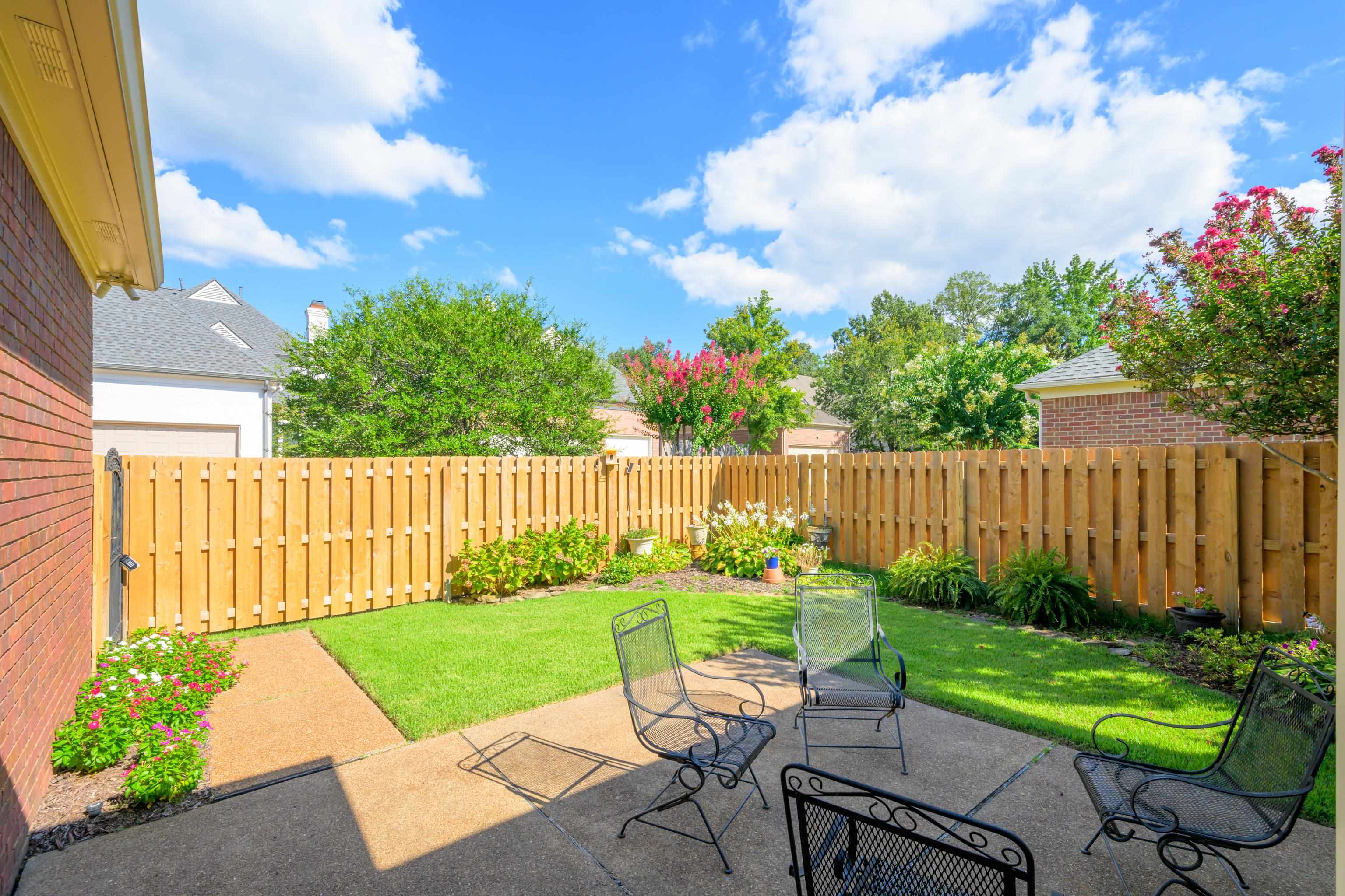 192 North White Station Road Memphis, TN 38117 - Photo 35 of 40 a view of a chair and table in the garden