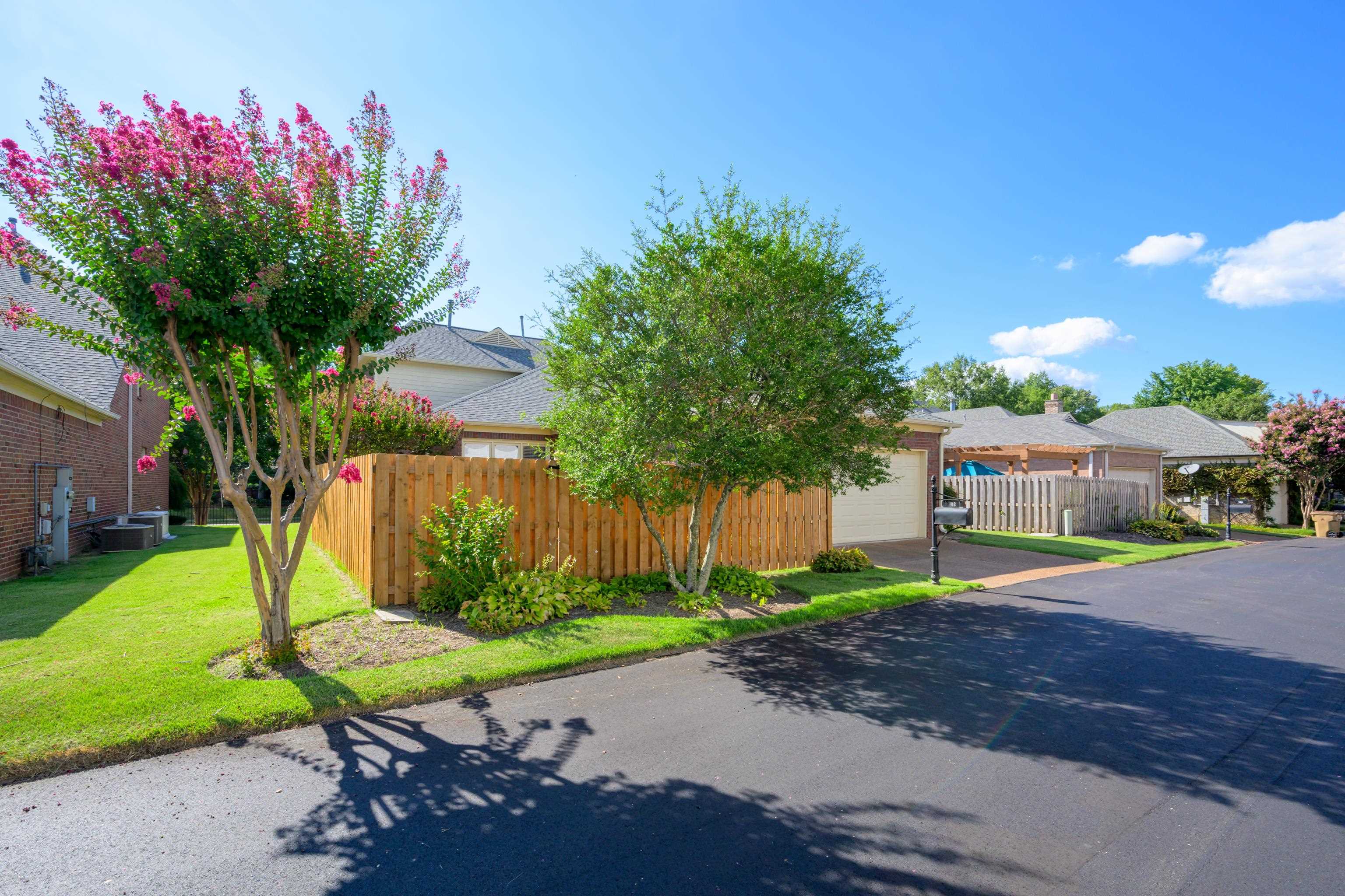 192 North White Station Road Memphis, TN 38117 - Photo 36 of 40 a view of a house with backyard and a patio