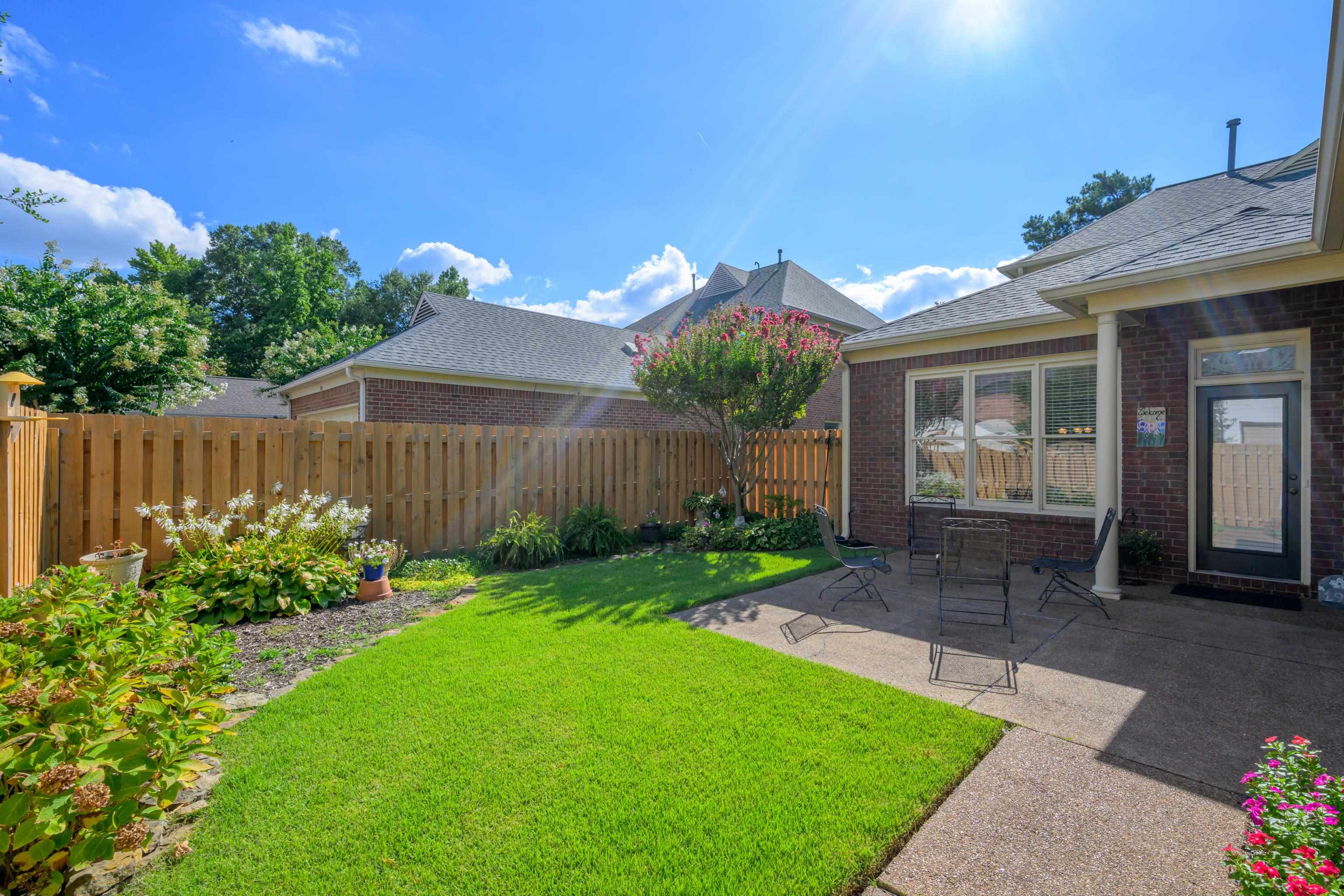 192 North White Station Road Memphis, TN 38117 - Photo 4 of 40 a view of an house with backyard space and garden
