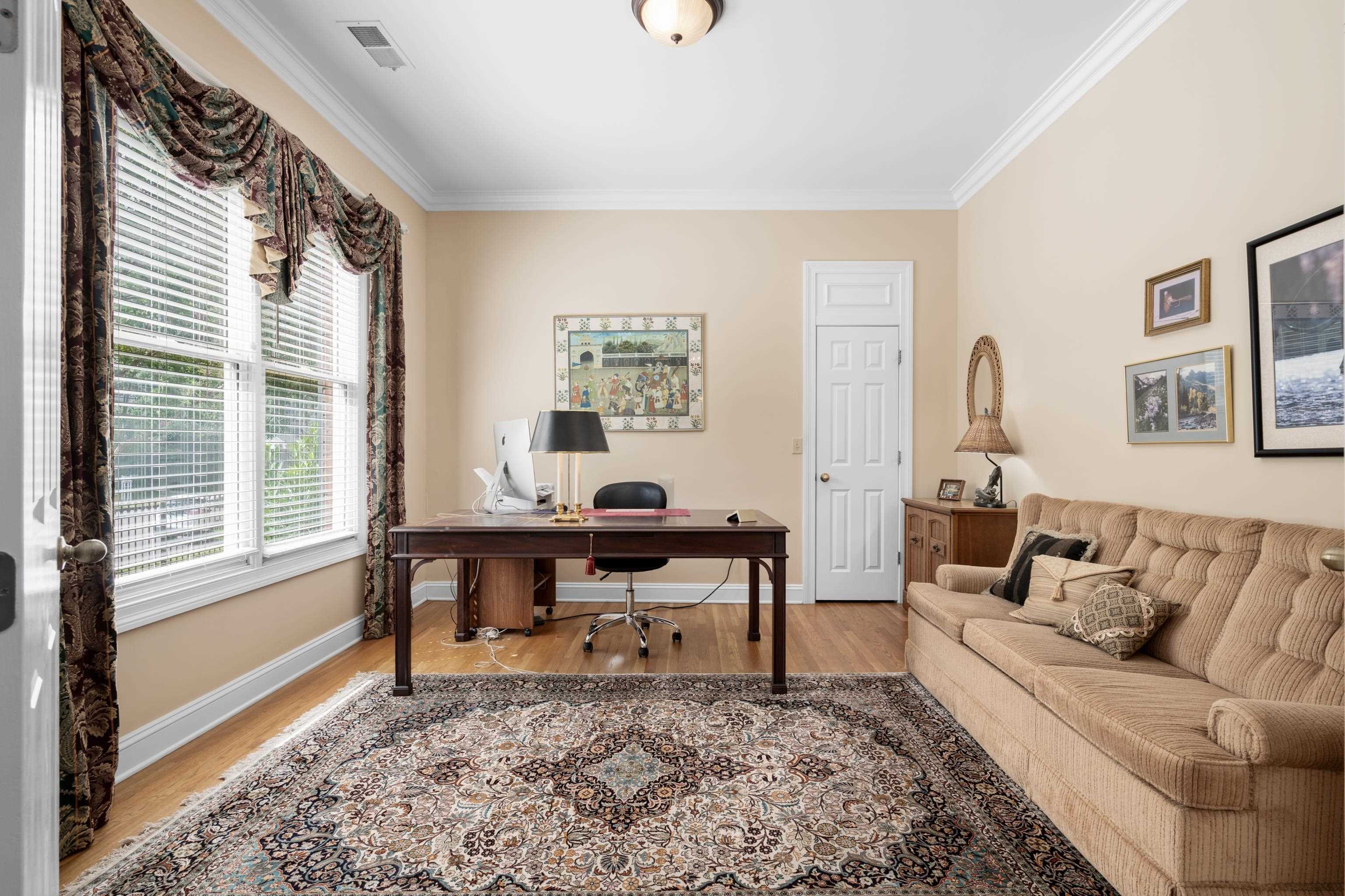 192 North White Station Road Memphis, TN 38117 - Photo 7 of 40 a living room with furniture and a window