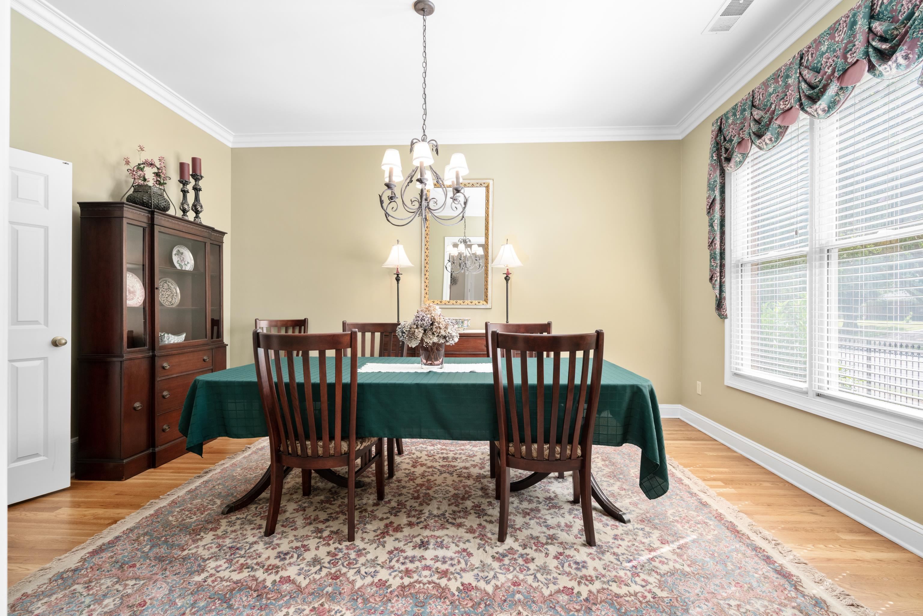 192 North White Station Road Memphis, TN 38117 - Photo 8 of 40 a view of a dining room with furniture window and wooden floor