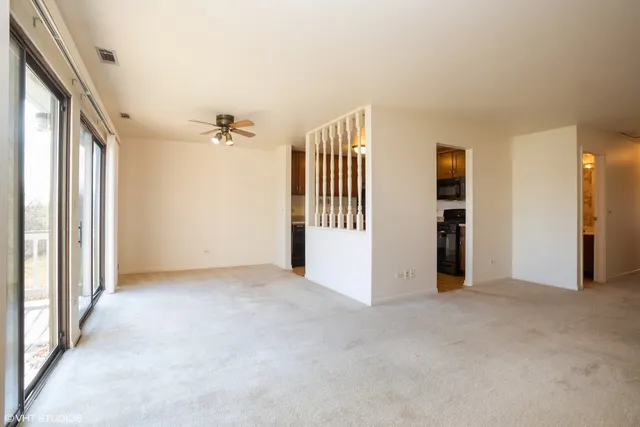 an empty room with windows