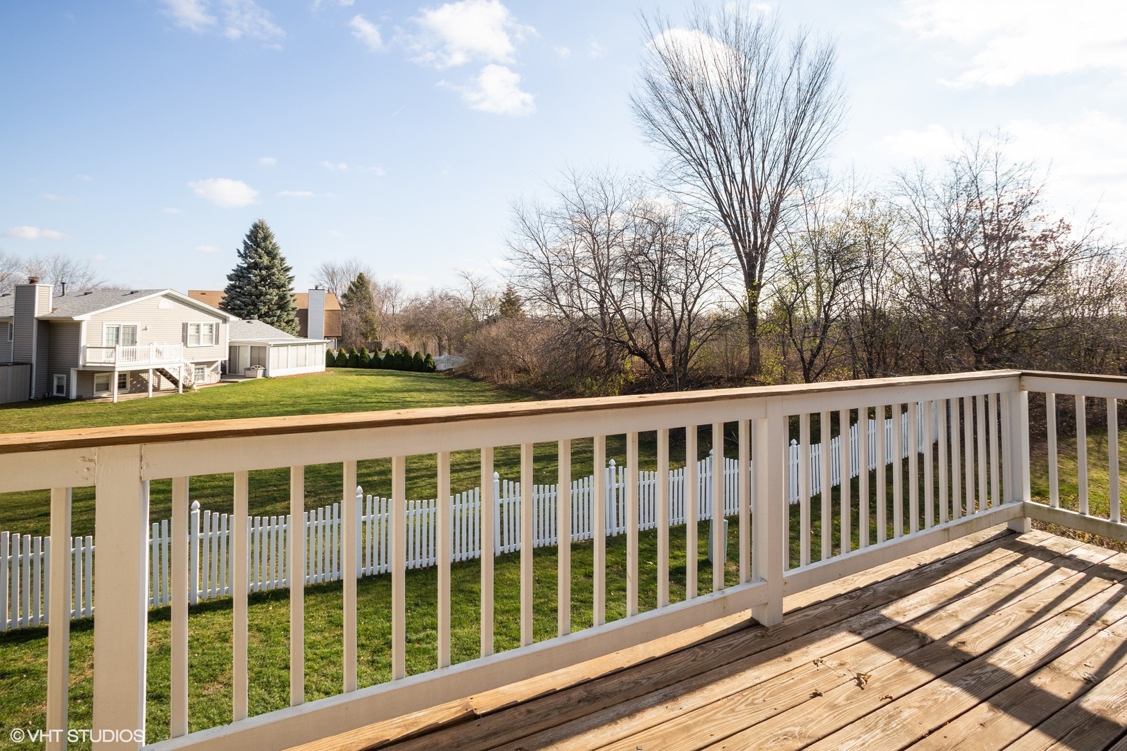 501 Cumberland Trail, Unit D Roselle, IL 60172 - Photo 10 of 10 a view of a large white building from a balcony