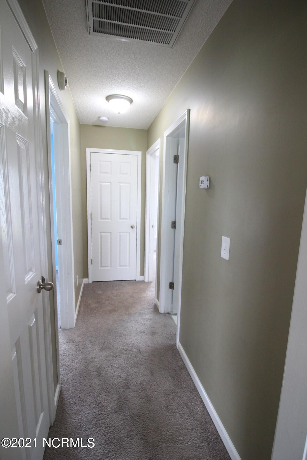 480 Godette School Road Havelock, NC 28532 - Photo 32 of 50 Guest bedroom Hallway