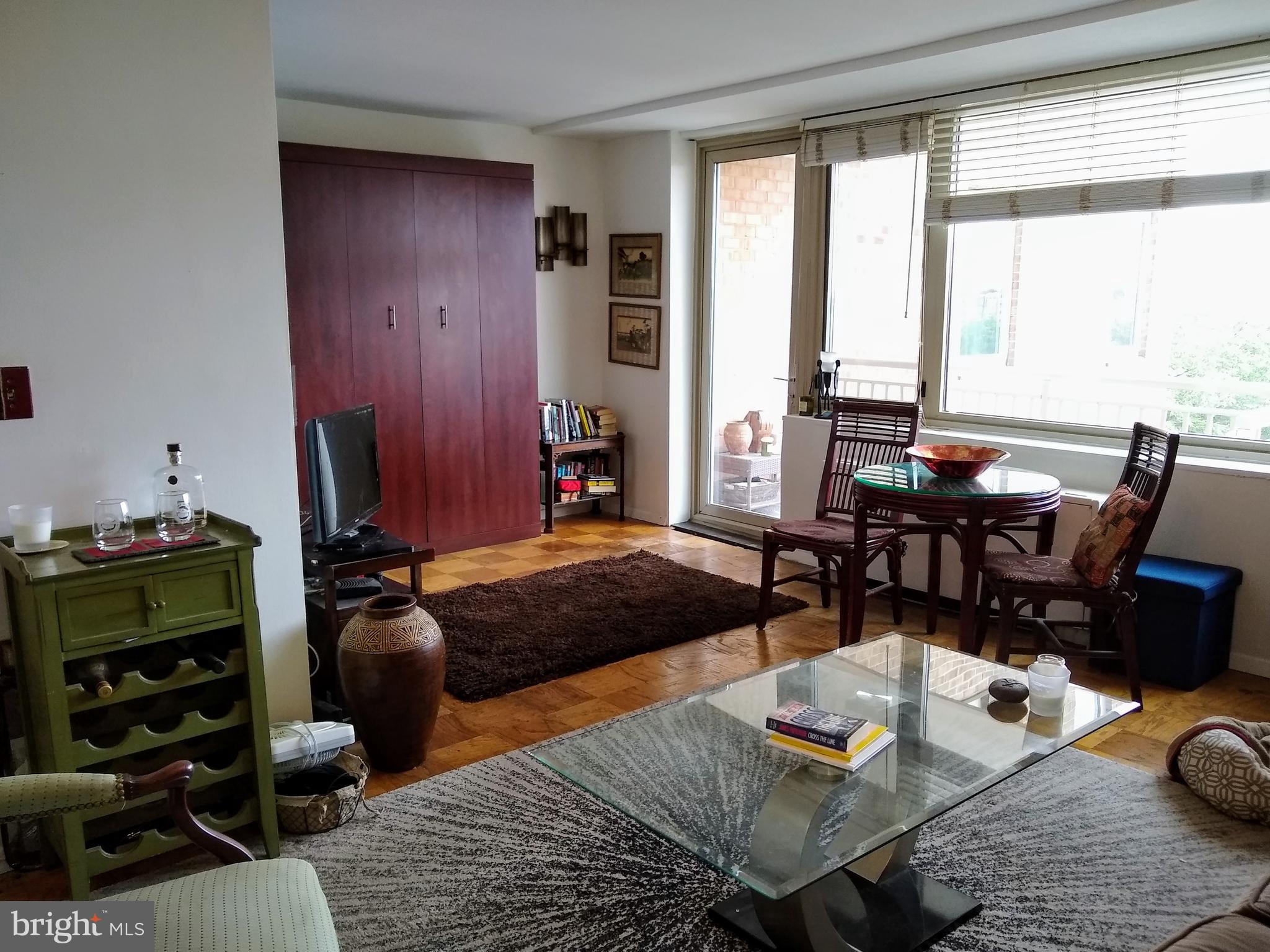 2800 Wisconsin Avenue Northwest, Unit 705 Washington, DC 20007 - Photo 10 of 42 The murphy bed nook and patio door