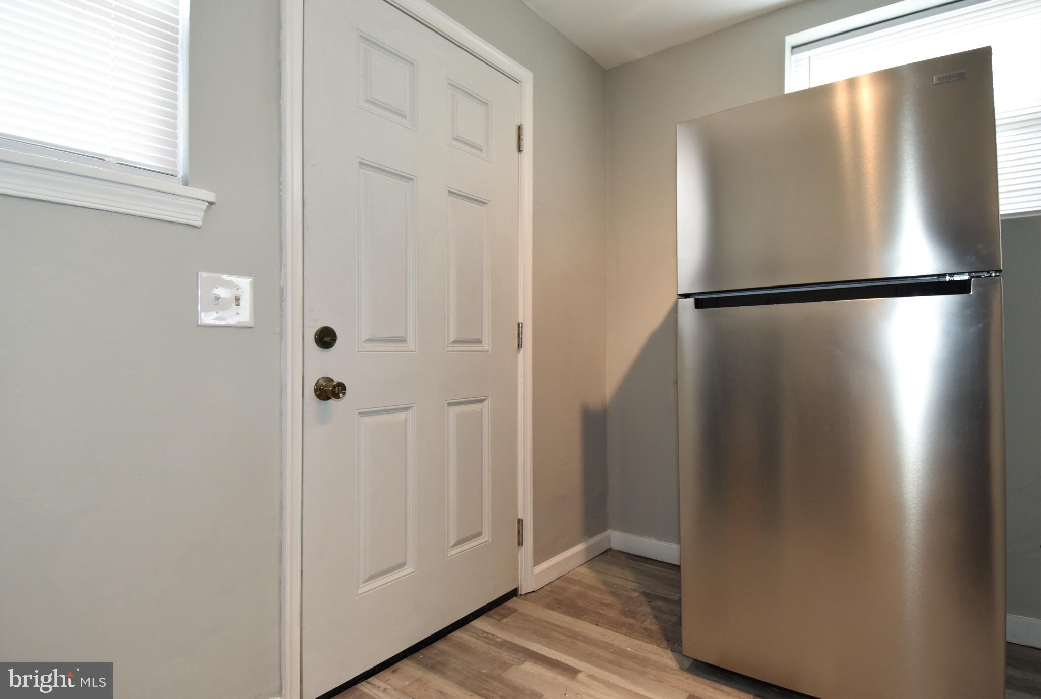 8208 Bellefonte Lane, Unit 5 Clinton, MD 20735 - Photo 5 of 17 Modern entryway with sleek appliances.