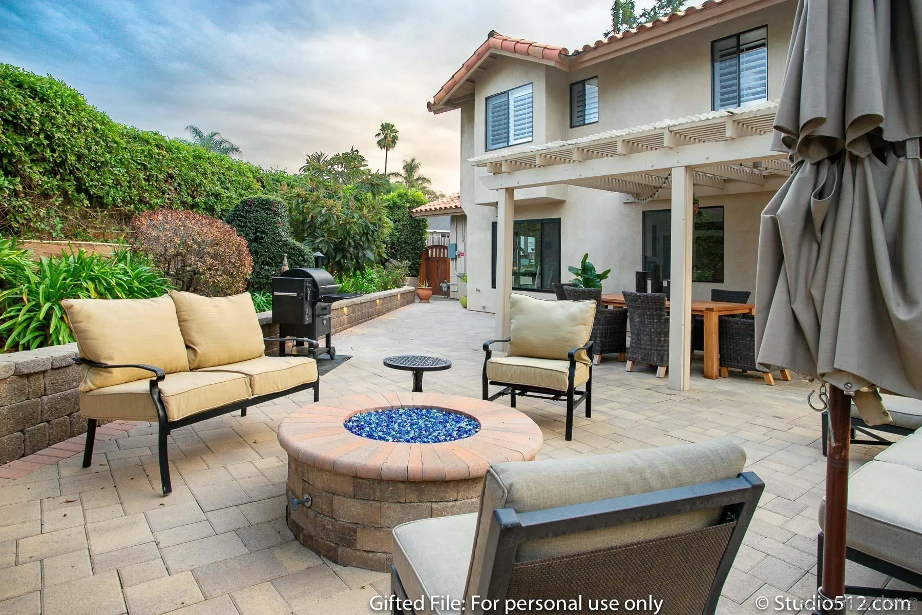 1259 Grandview Road Vista, CA 92084 - Photo 35 of 41 a view of a patio with couches table and chairs and potted plants