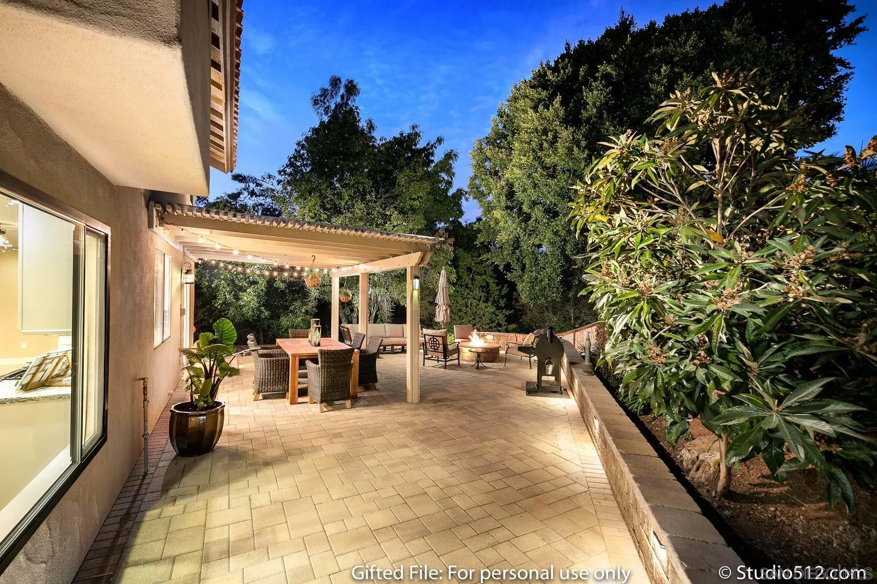 1259 Grandview Road Vista, CA 92084 - Photo 39 of 41 a view of a patio with table and chairs and potted plants