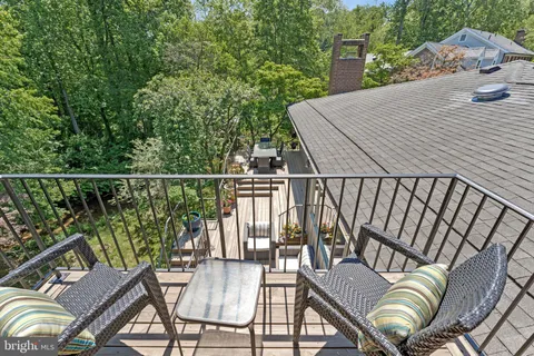 a view of a swimming pool with an outdoor space