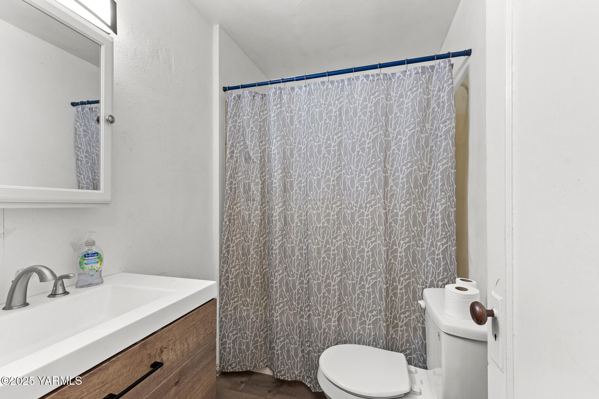 2832 South Wiley Road Yakima, WA 98903 - Photo 16 of 21 a bathroom with a sink and toilet