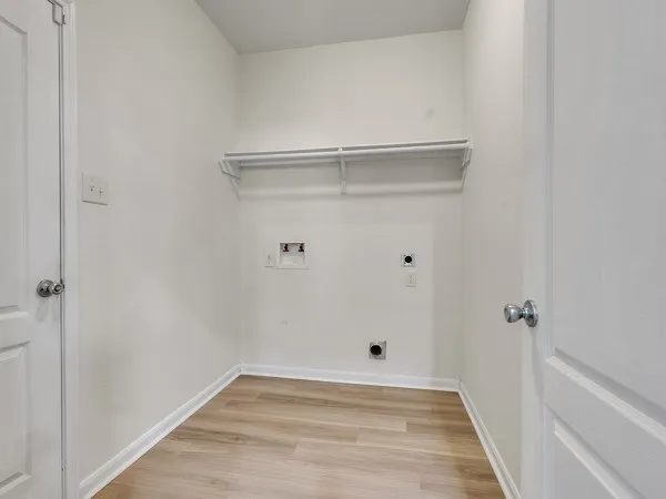 a bedroom with bed and a couch