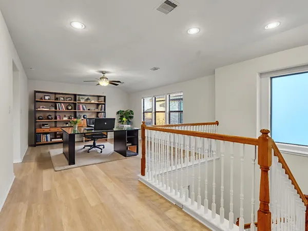 a view of hallway with livingroom