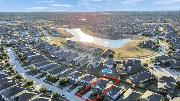 a patio with a table and chairs