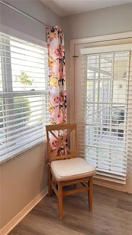 a room with furniture and windows