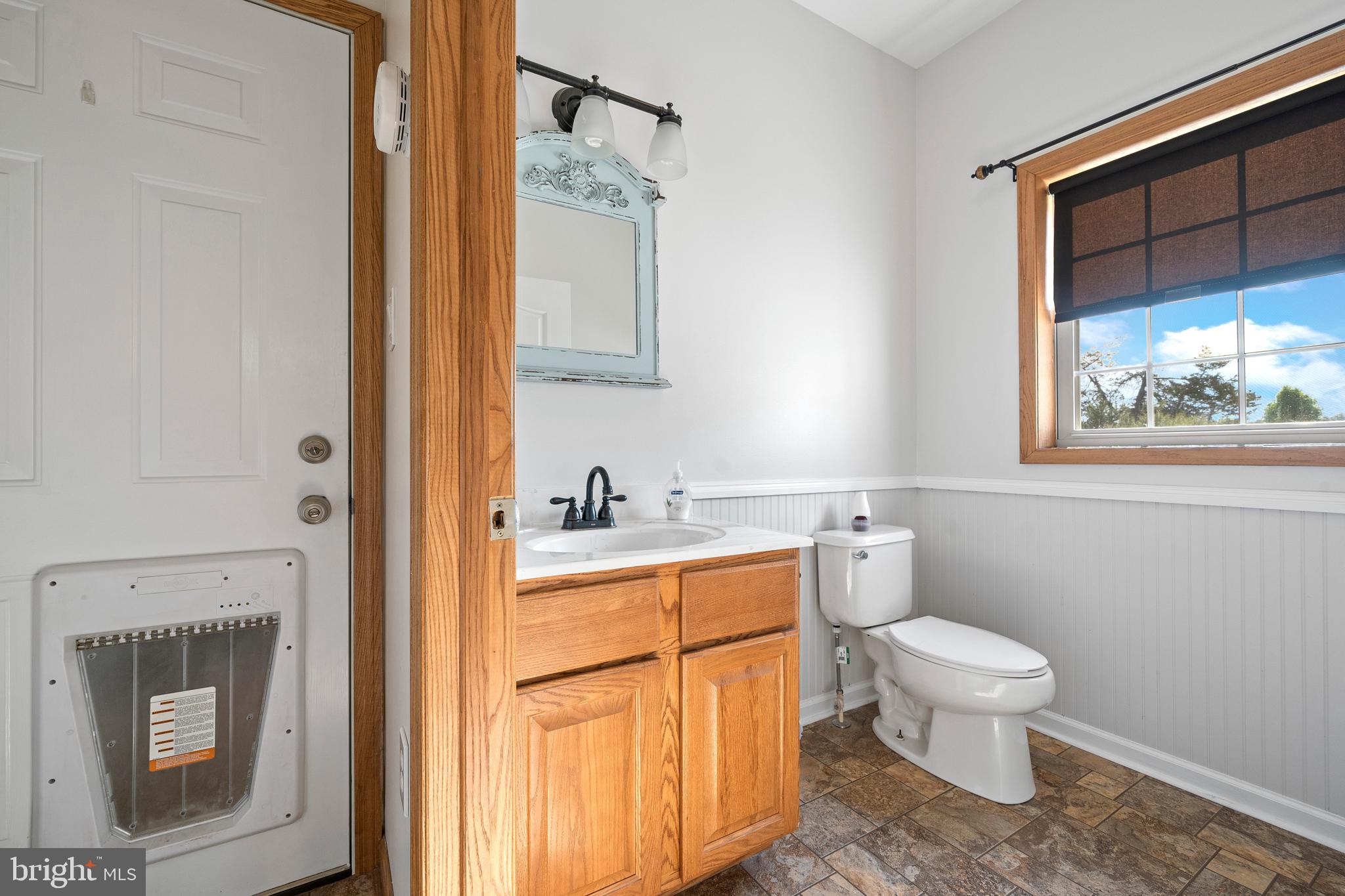 3980 Broomes Island Road Port Republic, MD 20676 - Photo 5 of 37 Half Bath next to Kitchen and Garage