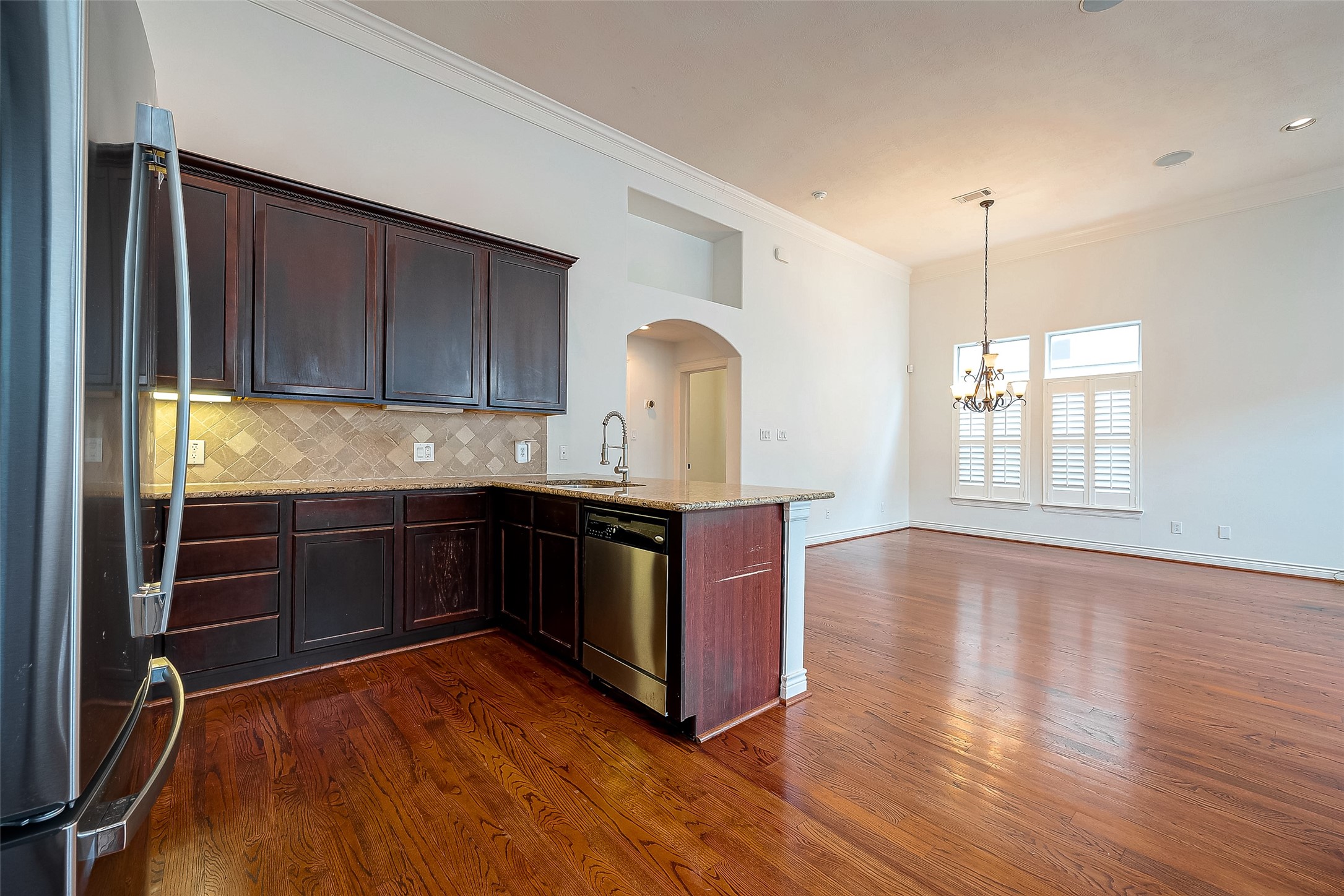 5608 Kansas Street, Unit B Houston, TX 77007 - Photo 8 of 24 View of kitchen overseeing the dining/living space.