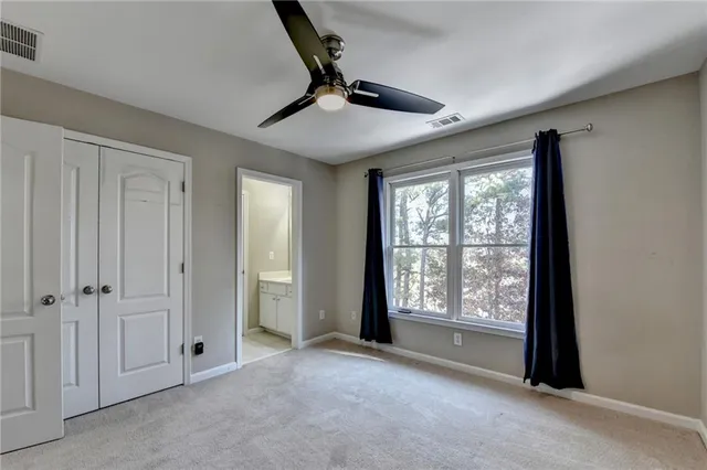 a view of empty room with windows