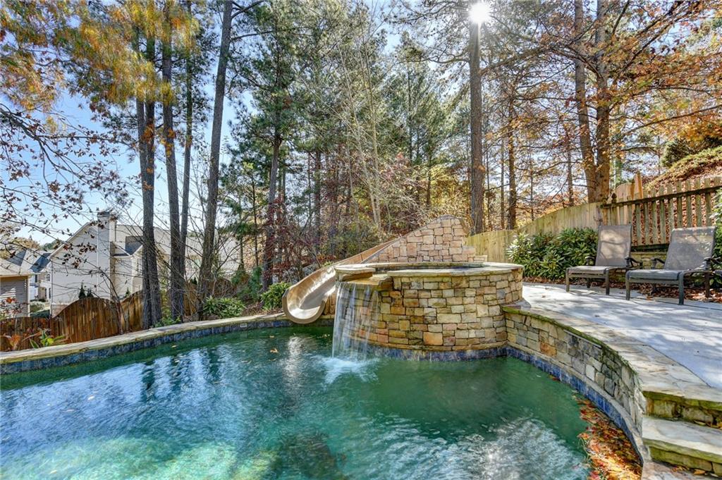 1601 Woodbow Crossing Dacula, GA 30019 - Photo 40 of 51 a view of outdoor space with garden and trees