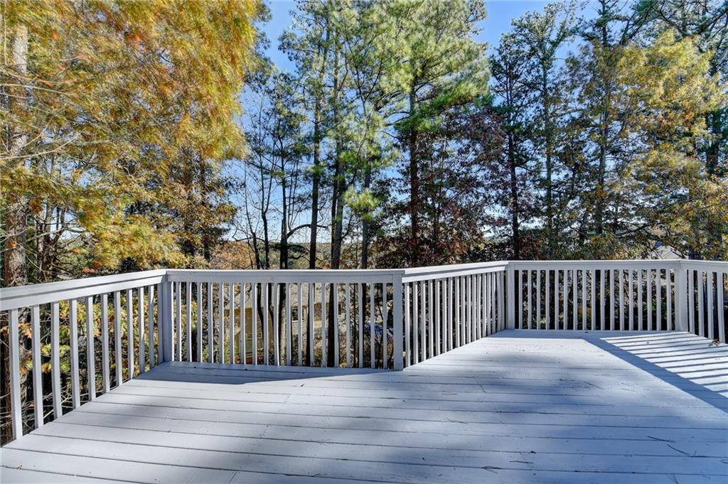 1601 Woodbow Crossing Dacula, GA 30019 - Photo 42 of 51 a view of balcony with wooden floor