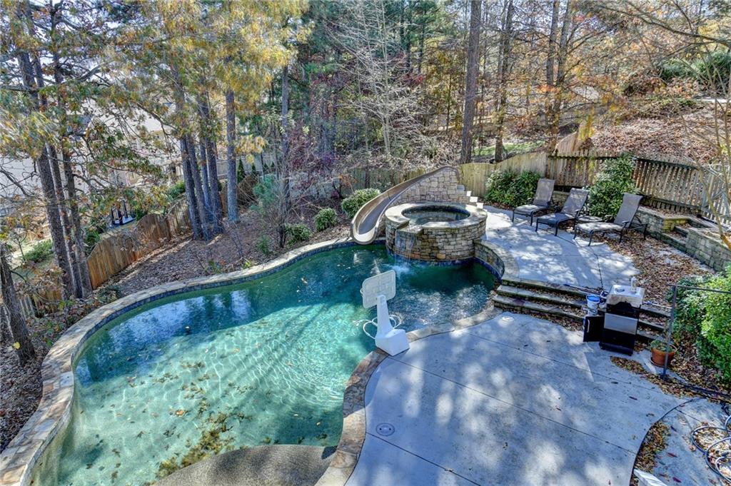 1601 Woodbow Crossing Dacula, GA 30019 - Photo 43 of 51 a view of a backyard with swimming pool