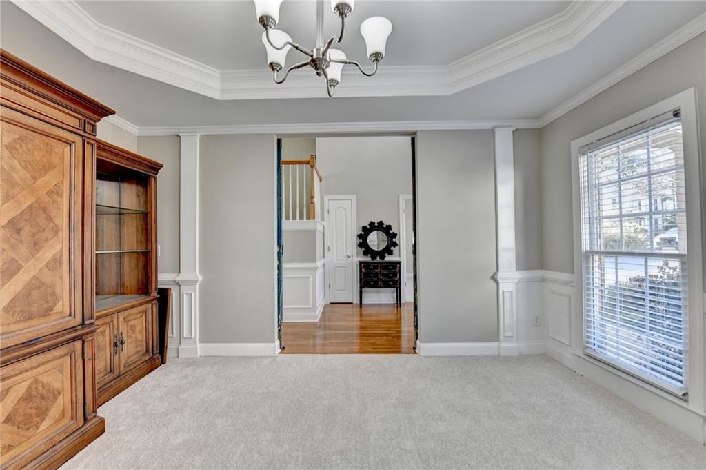 1601 Woodbow Crossing Dacula, GA 30019 - Photo 7 of 51 a view of an empty room with a window