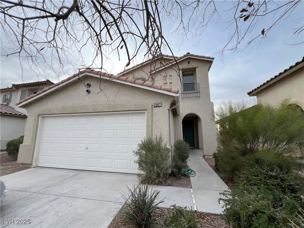Undisclosed Address Las Vegas, NV 89142 - Photo 1 of 23 Mediterranean / spanish home featuring a tiled roo