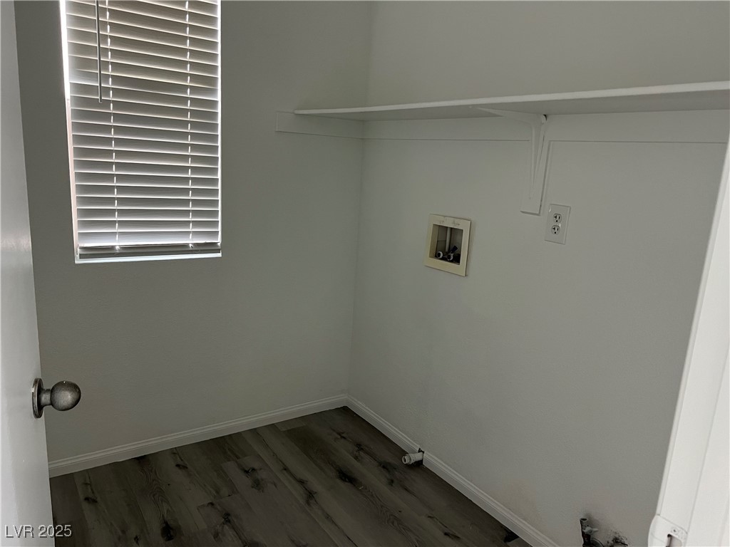 Undisclosed Address Las Vegas, NV 89142 - Photo 11 of 23 Laundry room featuring baseboards, wood finished f
