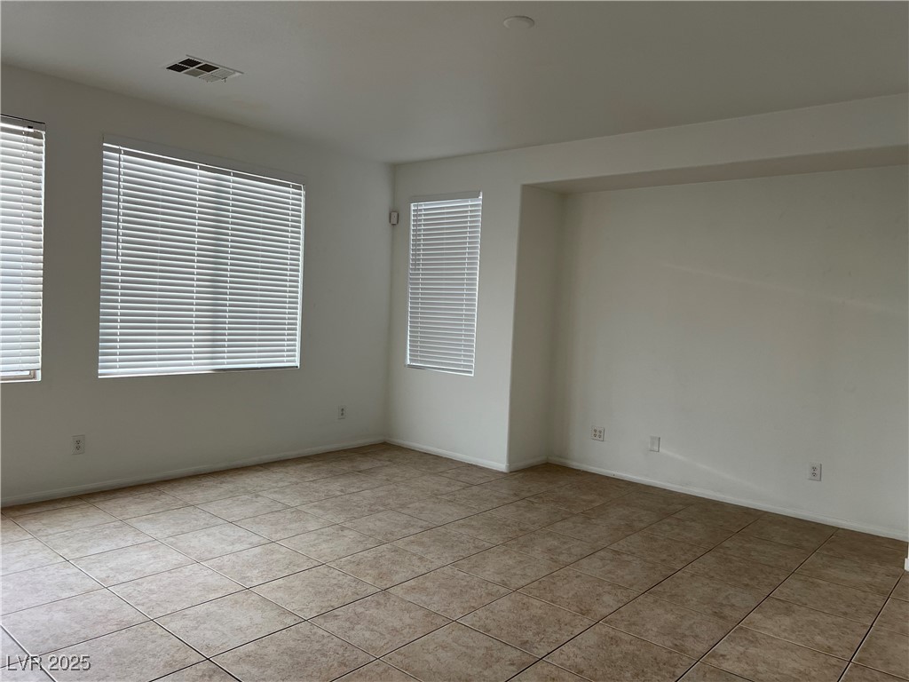 Undisclosed Address Las Vegas, NV 89142 - Photo 4 of 23 Empty room with a wealth of natural light, visible