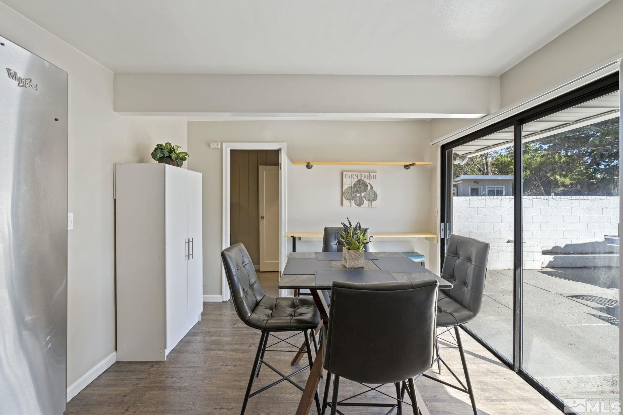 840 Bates Avenue Reno, NV 89502 - Photo 13 of 39 a view of a dining room with furniture window and outside view