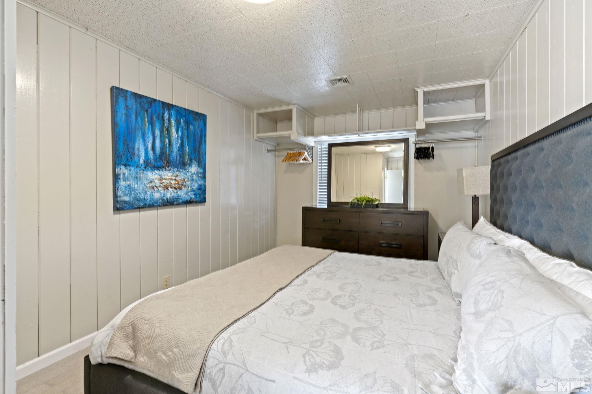840 Bates Avenue Reno, NV 89502 - Photo 18 of 39 a bedroom with a bed and a painting on the wall